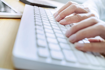 Close up of male business working in office.