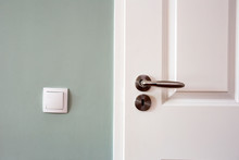 Modern White Door With Chrome Door Handle And Light Switch, New Clean Design