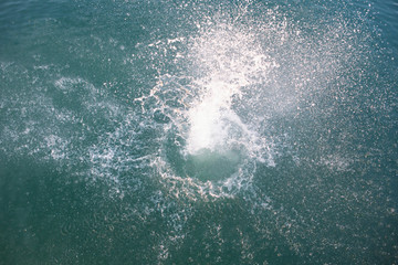 Wall Mural - big splash in lake water view from above