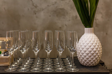 Wall Mural - Empty glasses in restaurant, black and white photo