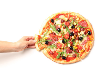 Wall Mural - Female hand takes a piece of pizza, isolated on white background