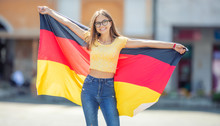 Attractive Happy Young Girl With The Germany Flag