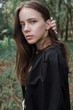 © Andrei Aleshyn/Stocksy - cute young girl in the forest closeup