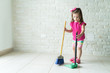 Little Kid With Cleaning Equipment At Home