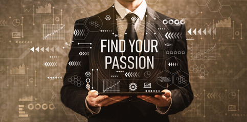 find your passion with businessman holding a tablet computer on a dark vintage background