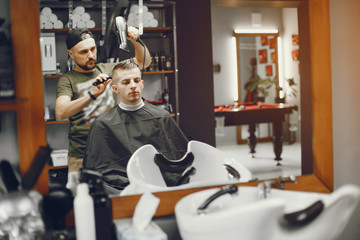 Wall Mural - A man in a barbershop. Stacking. Rest in hairdressing salon