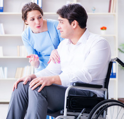 Wall Mural - Disabled patient on wheelchair visiting doctor for regular check