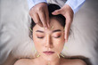 © geargodz - woman undergoing acupuncture treatment on face