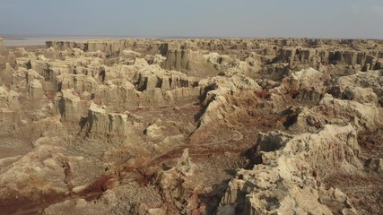 Wall Mural - panoramic drone flight over spectacular surreal salt mountains in the danakil desert, one of the hot