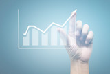 Fototapeta Młodzieżowe - Hand touching graphs of financial indicator and accounting market economy analysis chart