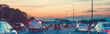 Night traffic. Cars on highway road at sunset evening in busy american city. Beautiful amazing urban view with red, yellow, blue sky. Sundown in downtown. Web header banner for website.