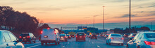 Night Traffic. Cars On Highway Road At Sunset Evening In Busy American City. Beautiful Amazing Urban View With Red, Yellow, Blue Sky. Sundown In Downtown. Web Header Banner For Website.