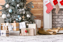 Many Beautiful Gift Boxes Under Christmas Tree