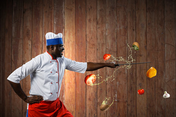 Black chef creative cooking. Mixed media.