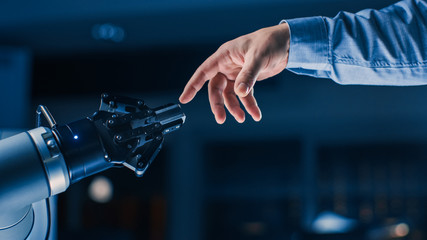 Poster - Futuristic Robot Arm Touches Human Hand in Humanity and Artificial Intelligence Unifying Gesture. Conscious Technology Meets Humanity. Concept Inspired by Michelangelo's Creation of Adam