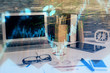 © peshkova - Multi exposure of forex graph and work space with computer. Concept of international online trading.