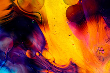 Abstract Rainbow Color Backdrop With Oil Drops And Waves On Water Surface