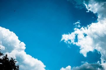 clear blue sky clouds background