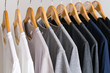 Close up of T-shirts on hangers, apparel background
