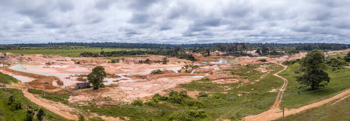 Wall Mural - aerial view of deforested area of the amazon rainforest caused by illegal mining activities in brazi