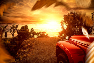 Golden sunset time and free space for your decoration. Autumn car trip and mountains landscape 