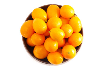 Wall Mural - Bowl of Fresh Kumquats Isolated on a White Background