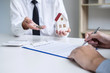 © Freedomz - Real estate agent Sales manager holding filing keys to customer after signing rental lease contract of sale purchase agreement, concerning mortgage loan offer for and house insurance