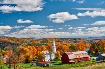 Wall Mural - Congregational Church and farm with red barn at sunny autumn day in Peacham, Vermont, USA