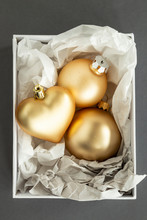 Golden Christmas Ornaments In A Box