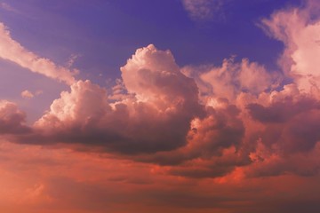 Wall Mural - beautiful shot of large clouds in the beautiful orange sky at sunset