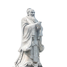 Confucius Statue Isolated On White Background. Located In Jianshui Confucius Temple, Jianshui, Yunnan, China.
