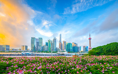 Poster - The morning of Lujiazui in Shanghai, China, with the prospect of flower beds