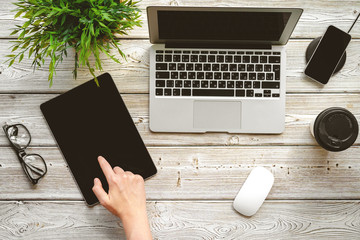 Poster - Flat lay office desk  Workspace with female hand, laptop top view