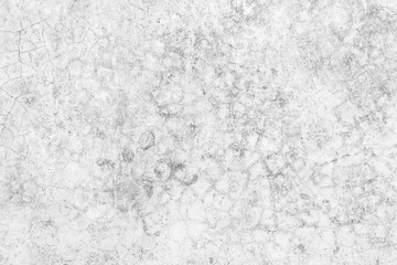 Grunge concrete wall at covered with gray cement old surface with crack in industrial building, great for your design and texture background. Black and white cracked floor texture vintage.