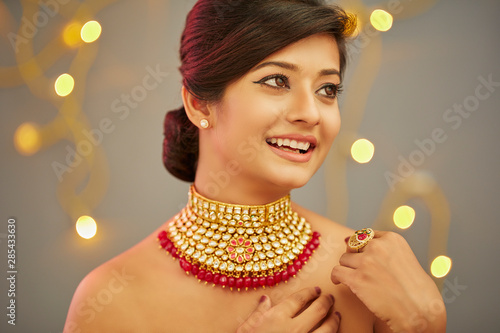 Beautiful Indian young women portrait with jewelry Canvas Print