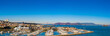 Panorama cityscape skyline view with Golden Gate Bridge, Alcatraz and buildings. Yachts and boats berthed by the waterfront pier in the west coast city.