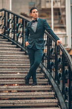 Elegantly Dressed Gentleman On Staircase