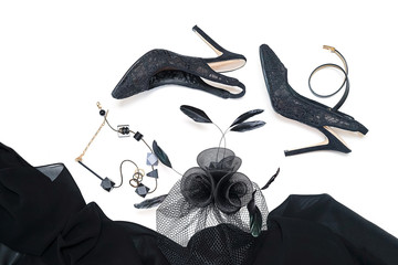 Halloween party female outfit collection accessories black on white background, shoes, cloth with skulls, jewelry, bag.