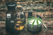Leinwandbild Motiv Cannabis face cream or moisturizer jar and cbd oil bottles concept.