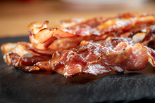 Crispy Hot Fried Bacon Pieces Closeup