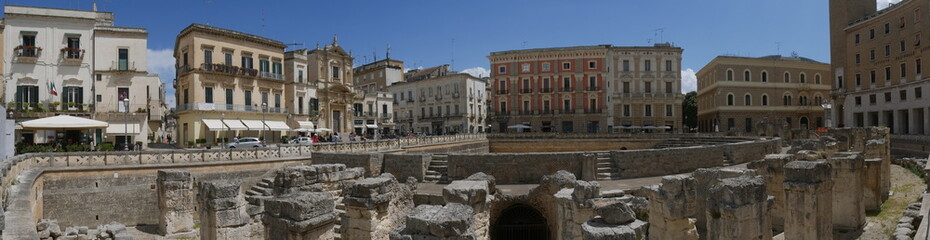 Wall Mural - Lecce –  St Oronzo Square. It includes :  the Roman amphitheater ; the St Oronzo Column ; the Sedile palace was the ancient seat of the Town Hall ; St Mark Church ; Bank of Italy palace