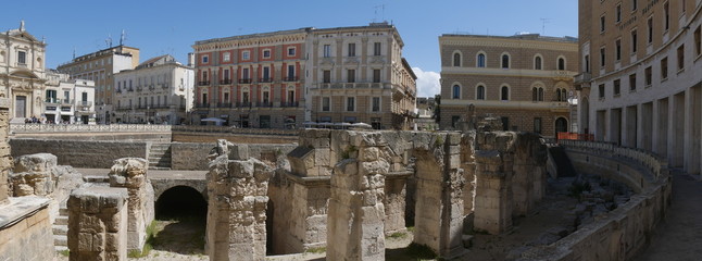 Wall Mural - Lecce –  St Oronzo Square. It includes :  the Roman amphitheater ; the St Oronzo Column ; the Sedile palace was the ancient seat of the Town Hall ; St Mark Church ; Bank of Italy palace