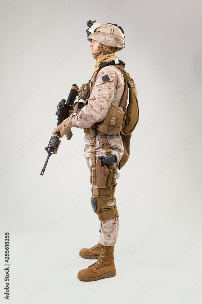 Modern Rifles Uniform Studio shoot of modern infantry soldier, U.S. marine rifleman in combat ...