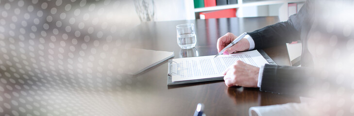 Business people taking notes; panoramic banner