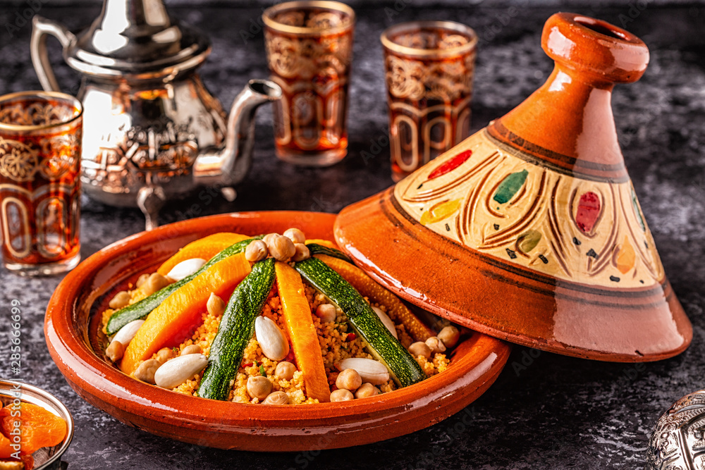Vegetable tagine with almond and chickpea couscous. - obrazy, fototapety, plakaty 