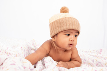 Wall Mural - Little baby boy lying and smiling