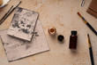 Artist's workspace flatlay. Art equipment on rustic background. Overhead image with copy space.