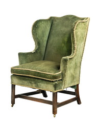 old antique unrestored wing arm chair upholstered  green isolated on white