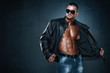 © mrbigphoto - Handsome Athletic Male Model Wearing Leather Jacket on Naked Torso