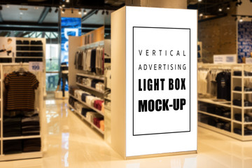 Mock up perspective vertical light box in clothing showroom